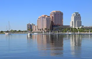 Skyscrapers next to a port and water