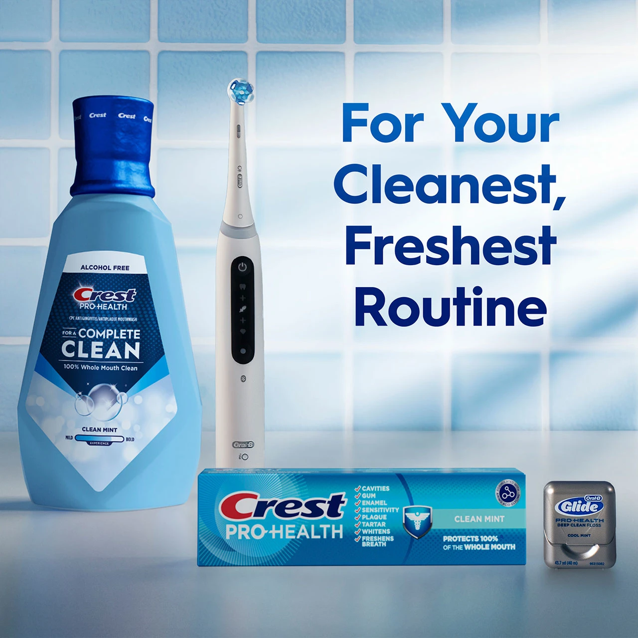 Crest Pro‑Health mouthwash, Crest Pro‑Health toothpaste, Oral‑B electric toothbrush and Glide floss with text ‘For Your Cleanest, Freshest Routine.’