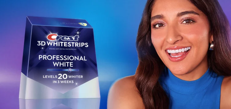 Crest 3D Whitestrips package and woman smiling against a gradient background