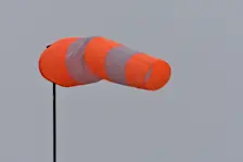 Een grijze lucht en een stevige wind, er kan de komende dagen flink wat regen vallen - Cynthia van Leusden