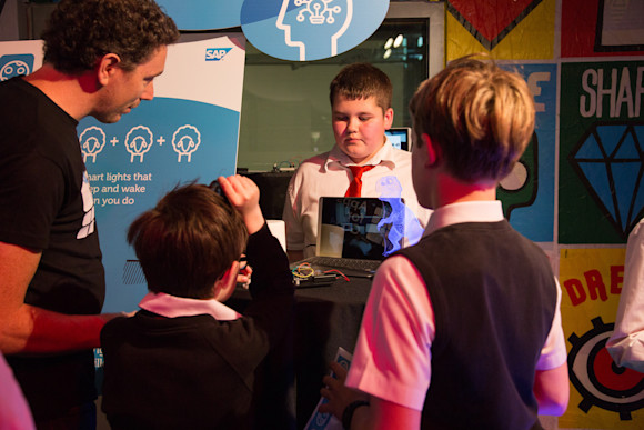 Photo - student with IoT in marketplace