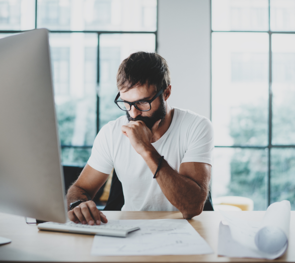 copywriter working at his computer