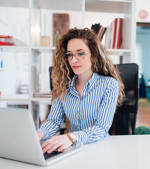 woman typing on laptop computer