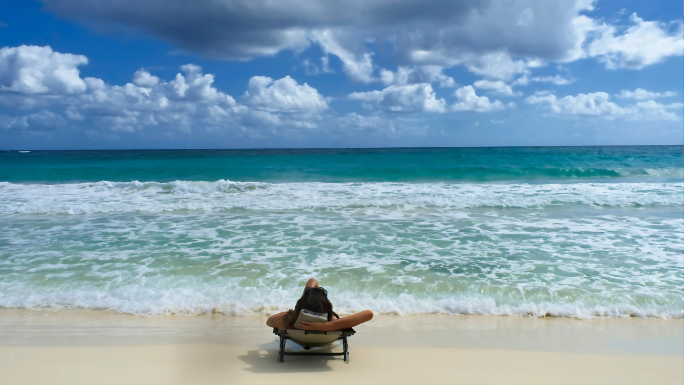 Man-relaxing-beach-private