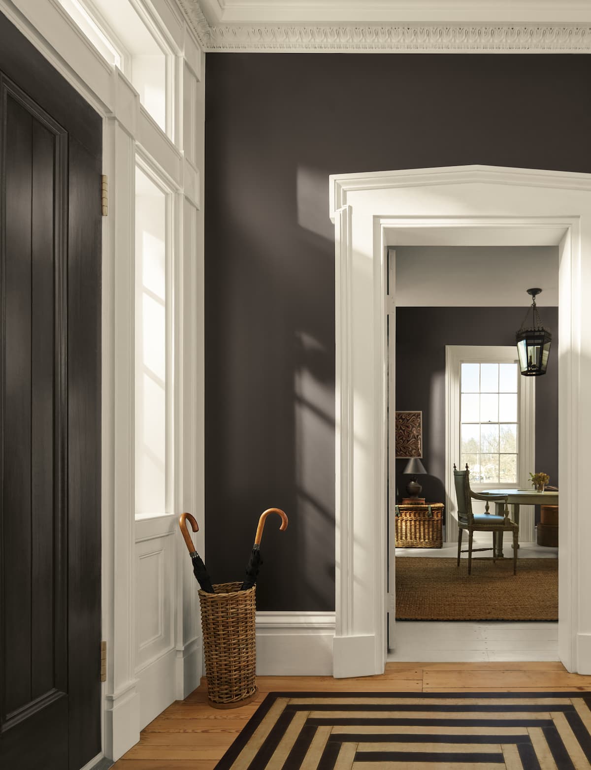 Entry way painted in Silhouette, Benjamin Moore's Paint Color of the Year for 2026