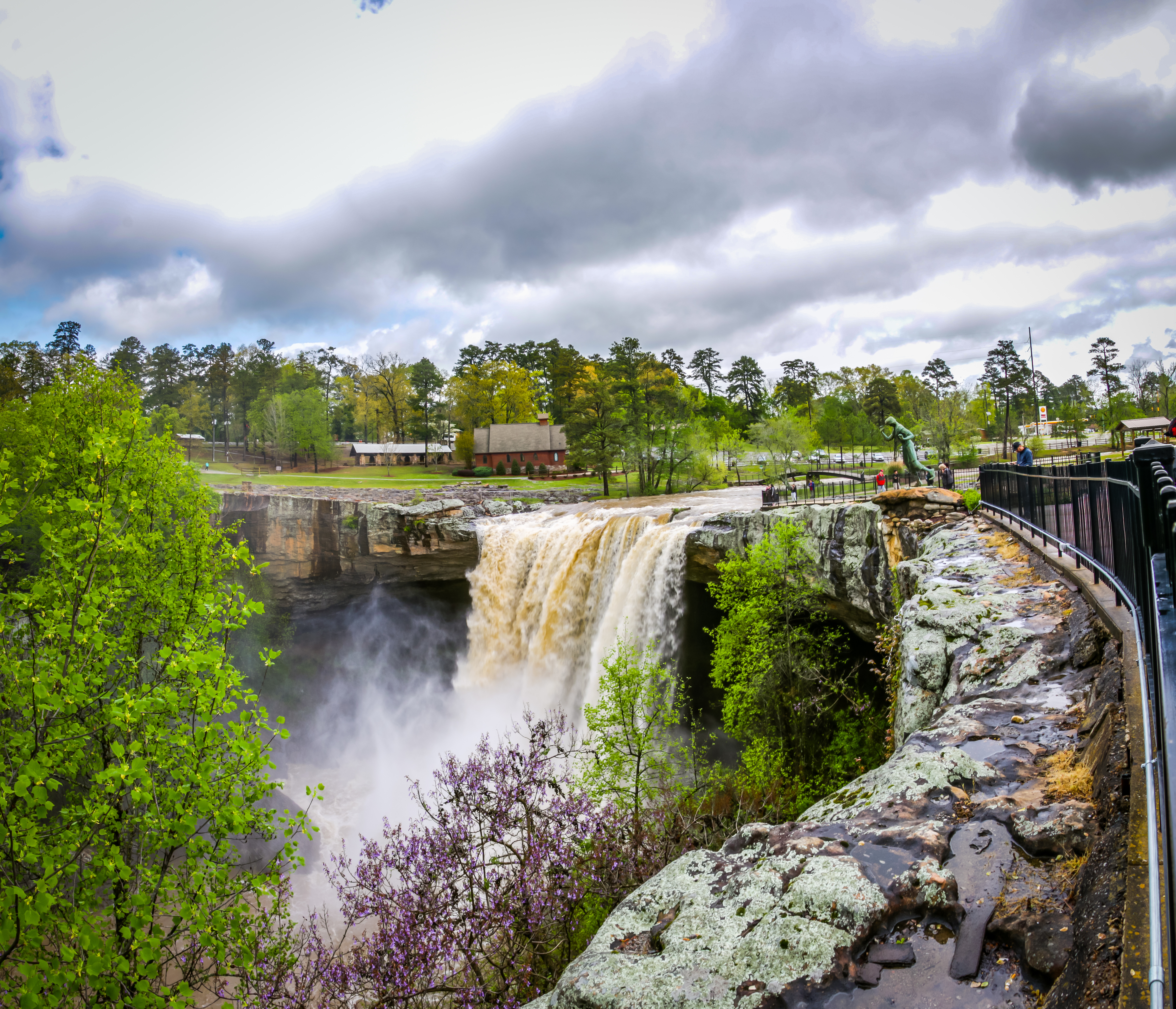 Rushing falls with beautiful trees and green spaces