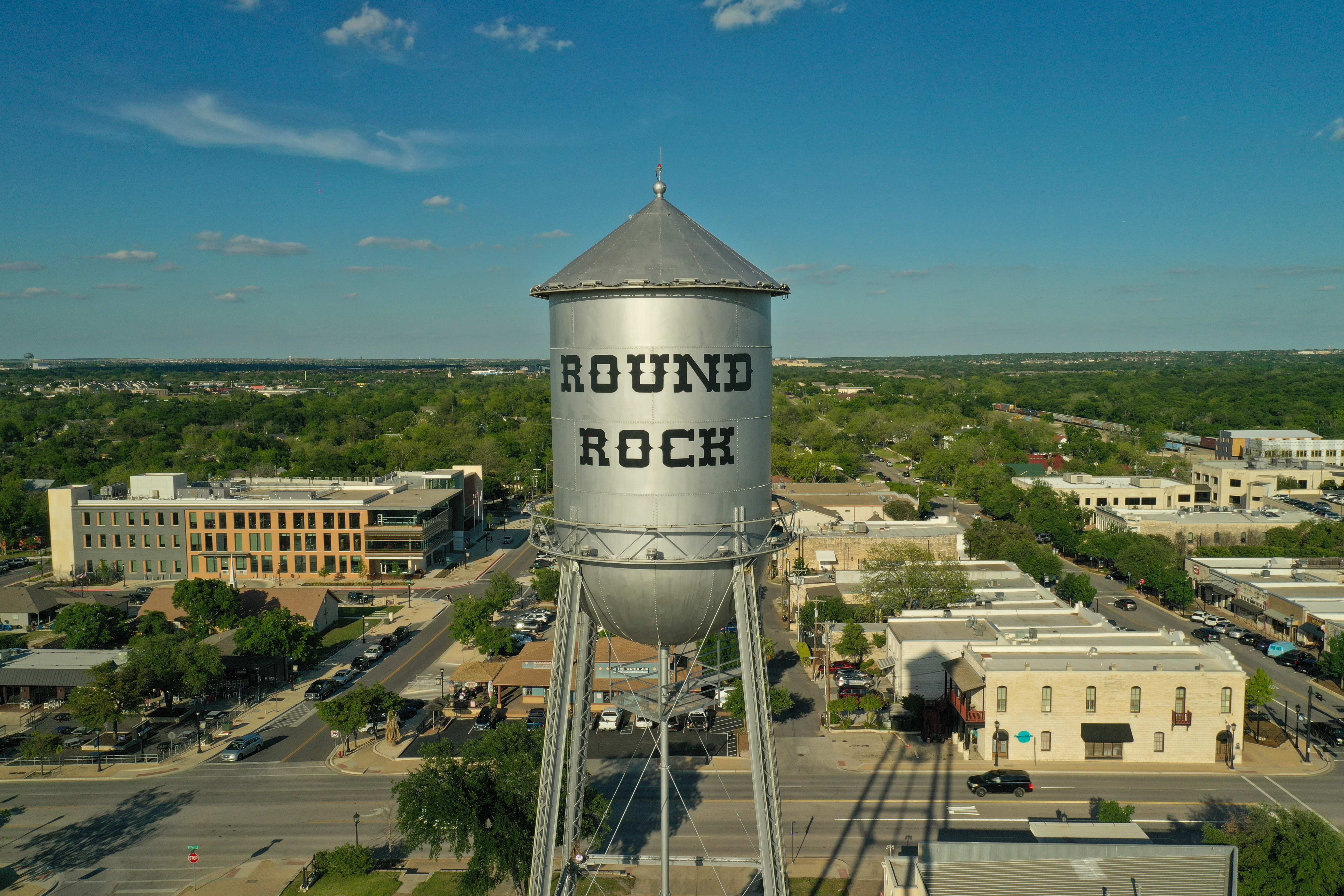 water tower and aerial view of Round Rock, Texas
