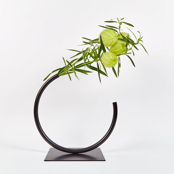Edging Over Vase by ACV Studio