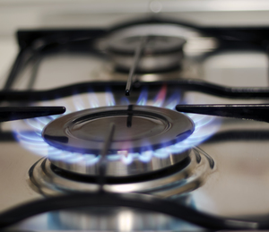 Centrica chief: Britain will import 70% of its natural gas supply by 2020 Image of a gas stove with its flame on.