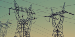 How to protect yourself against energy price hikes Electricity pylons in the early evening.
