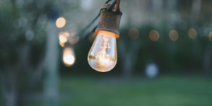 Can Ofgem deliver a fairer energy deal? A bright lightbulb in the outdoors.