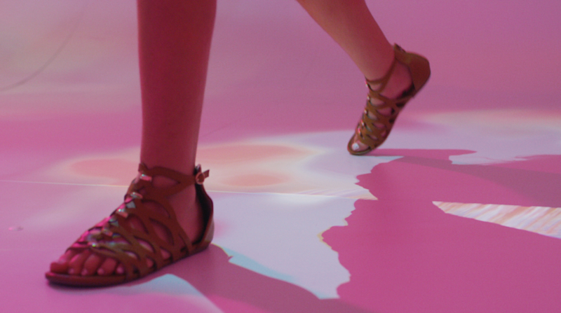 Visitors can track both their own shadows and projected representations of their bodies on the Colorscape floor canvas.
