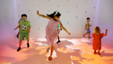 Families can safely get the wiggles out in the Colorscape color-mixing alcove.