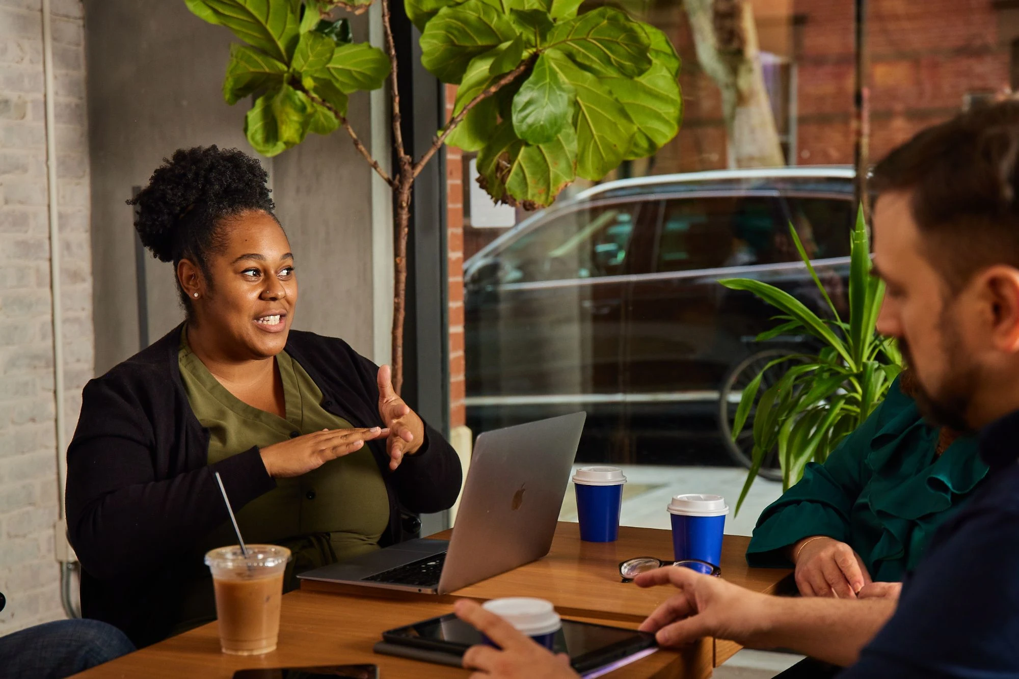 Our Kaplan Culture - Empowering - man and woman in meeting