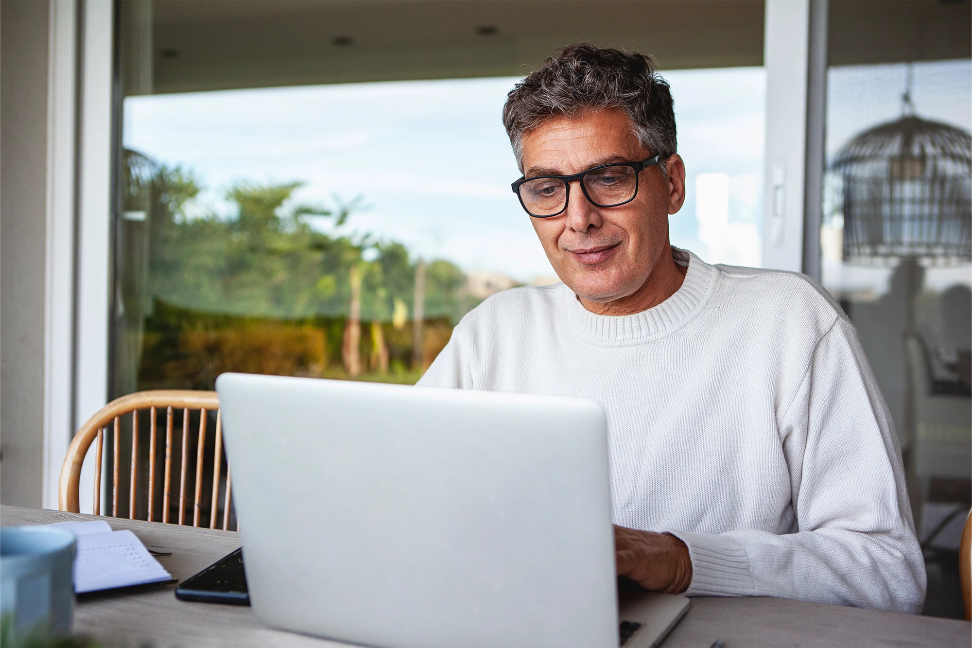 dearborn - man at home on laptop