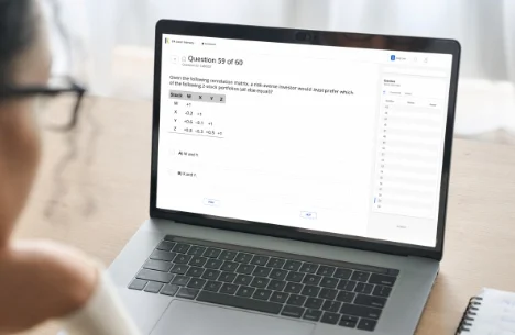 person-on-laptop-taking-cfa-level-1-free-diagnostic-exam-testing-their-baseline-knowledge-of-cfa-level-I-exam-material