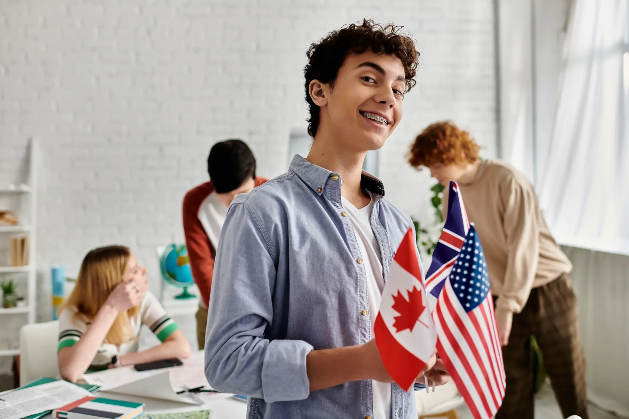 Student holding flags
