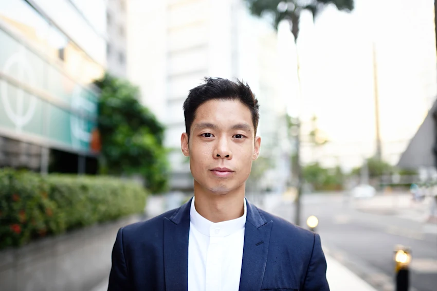 CFA charterholder man with suit standing in financial district