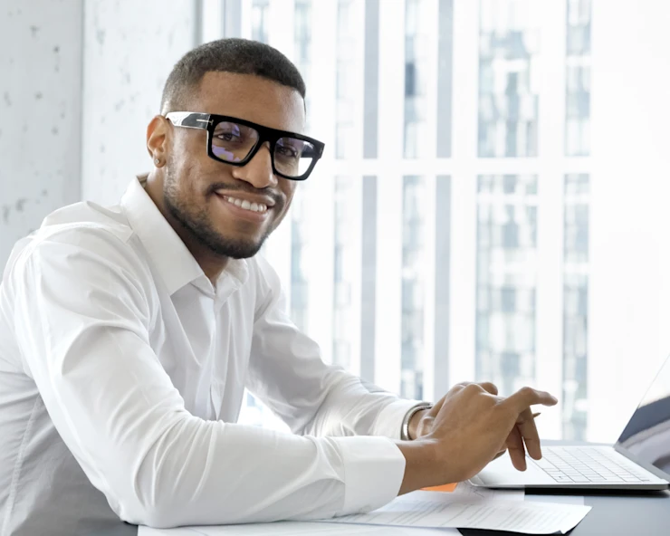 Legal - man with glasses working laptop