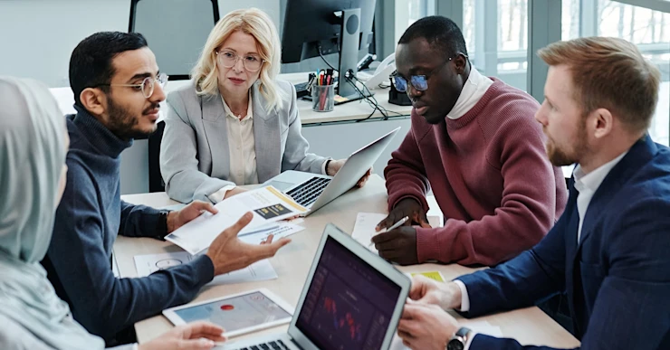 group-of-chartered-financial-analysts-in-a-business-meeting