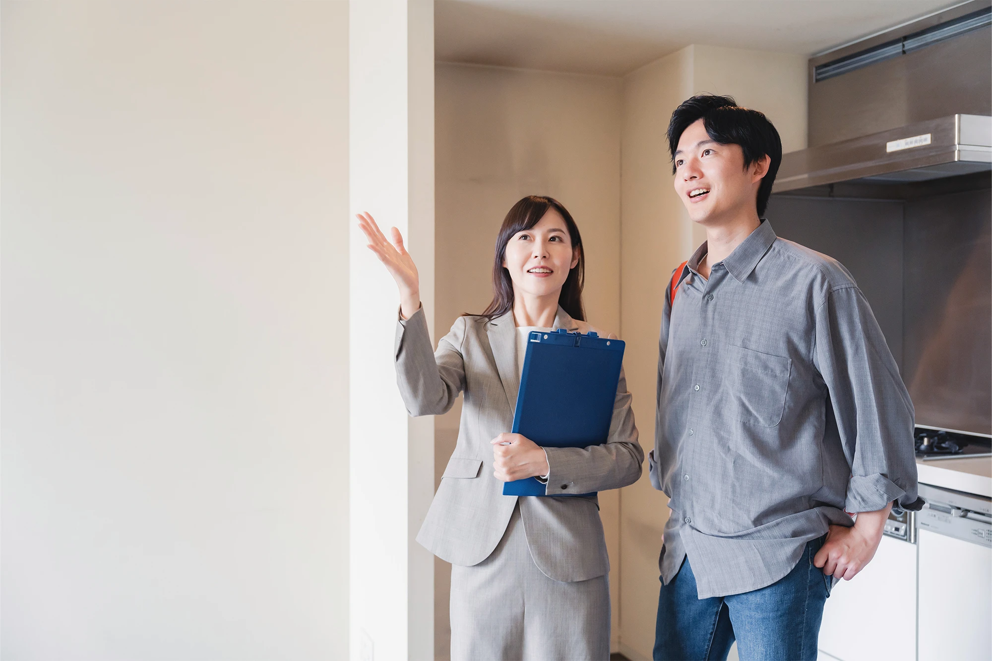 dearborn - realtor showing man open house