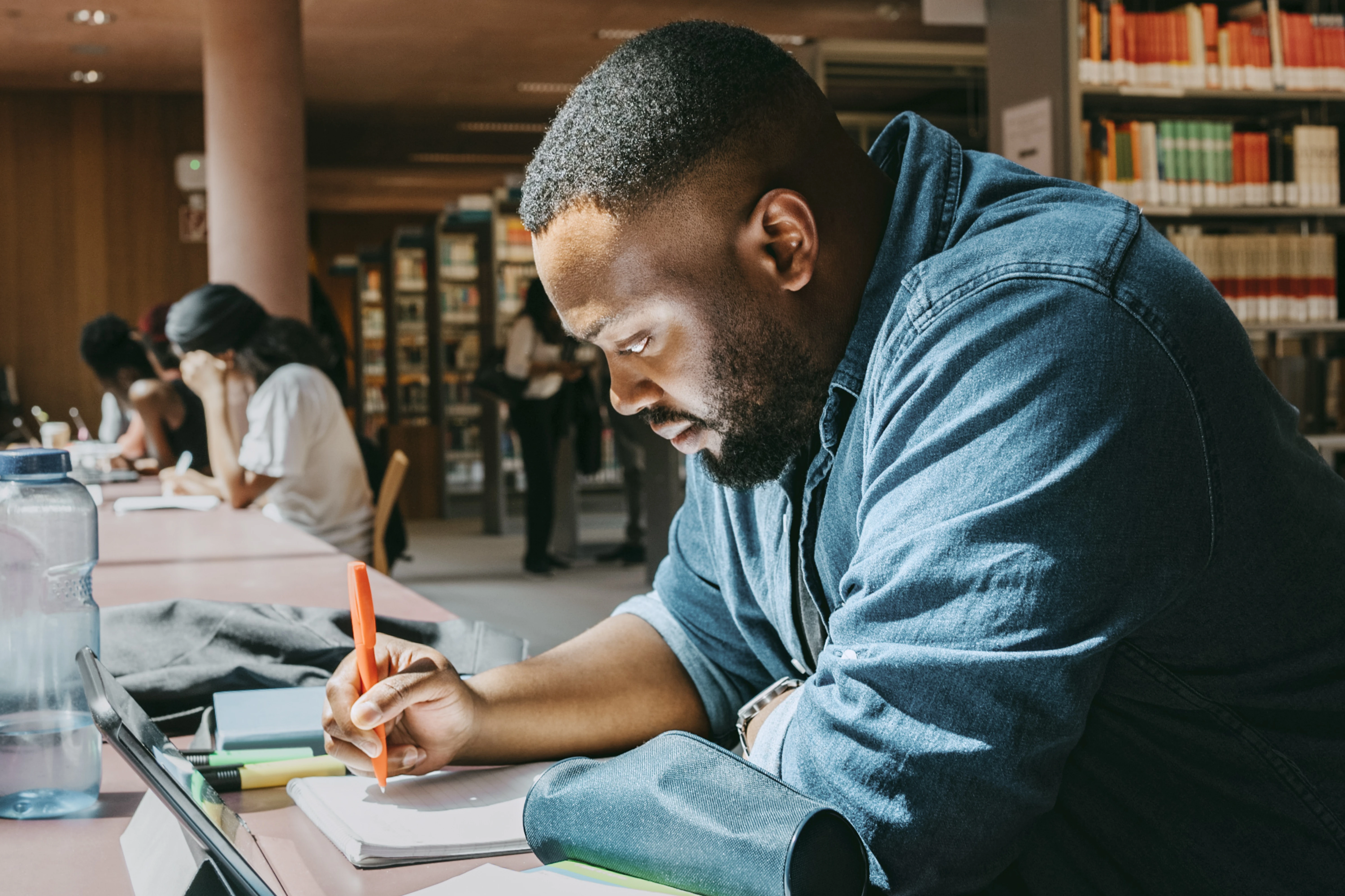 Delaware State University student studying at library
