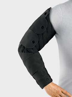 __Tribute® Wrap is an adjustable garment with foam technology that nestles into the tissue to promote skin health.__
- It comfortably adjusts to your patient’s unique shape and lifestyle to help maintain gains made during therapy, while allowing the flexibility to support further reduction.
- Simply slide it on, adjust the straps, and cover with Sleep Sleeve for a comfortable experience.