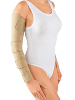 ## Inelastic compression wrap for the arm in ready-to-wear and custom sizes
- Indicated for mild to severe lymphedema
- Juxtaposing bands make independent application and removal easy
- Made from a flexible and soft material for all-day comfort
- Anatomic right & left styles for the perfect fit in sensitive areas
- 4 compression levels possible in one garment: 10-20, 20-30, 30-40, and 40+ mmHg
Circaid juxtafit essentials arm and hand garments allow for quick and easy application and require minimal adjustments without removal to help maintain required gradient compression levels. The sleeve can be worn 24 hours a day with the locking bands being slightly loosened for night time wear. The comfortable design gives excellent arm and hand coverage and allows patient to manage their Lymphedema while maintaining an independent lifestyle.
__Details:__
- Indicated for mild to severe lymphedema
- Ready-to-wear sleeve in 6 sizes & 3 lengths and custom configurations
- Flexible and soft material for all-day comfort
- Patented Built-In-Pressure System (BPS) ensures accurate, gradient compression