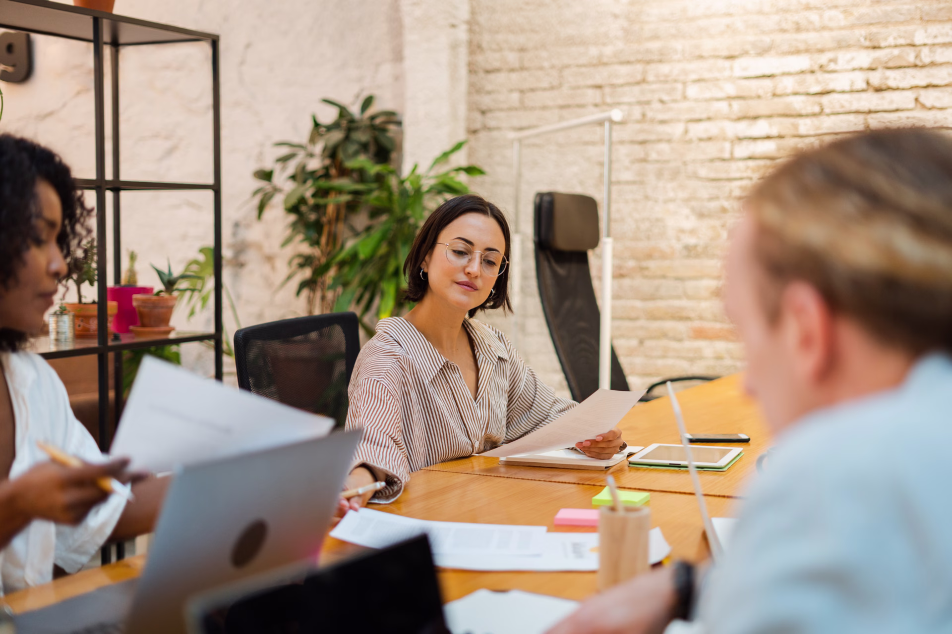 Team Meeting in Modern Office Conference Room - stock image