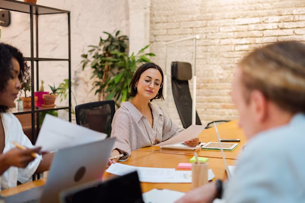Team Meeting in Modern Office Conference Room - stock image