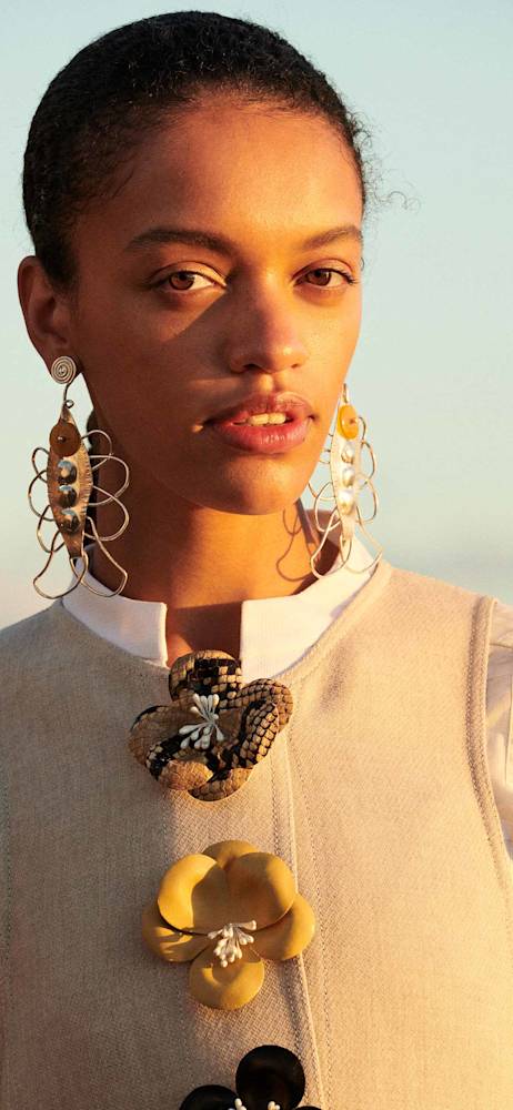tory-burch-holding-1
