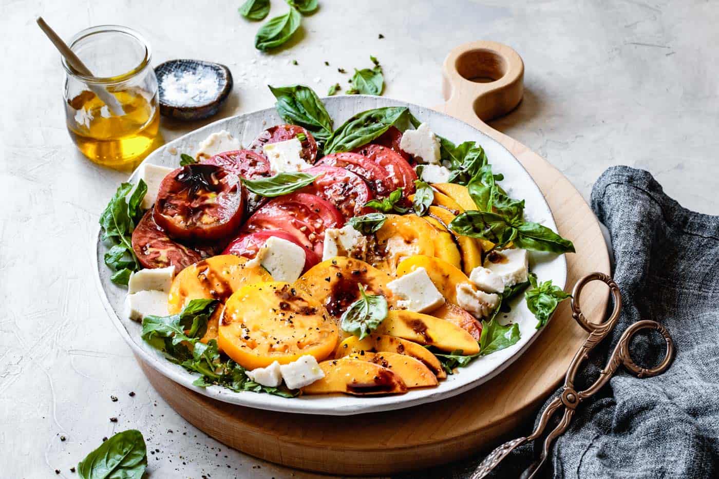 Vegan Caprese Salad with Peaches and Arugula