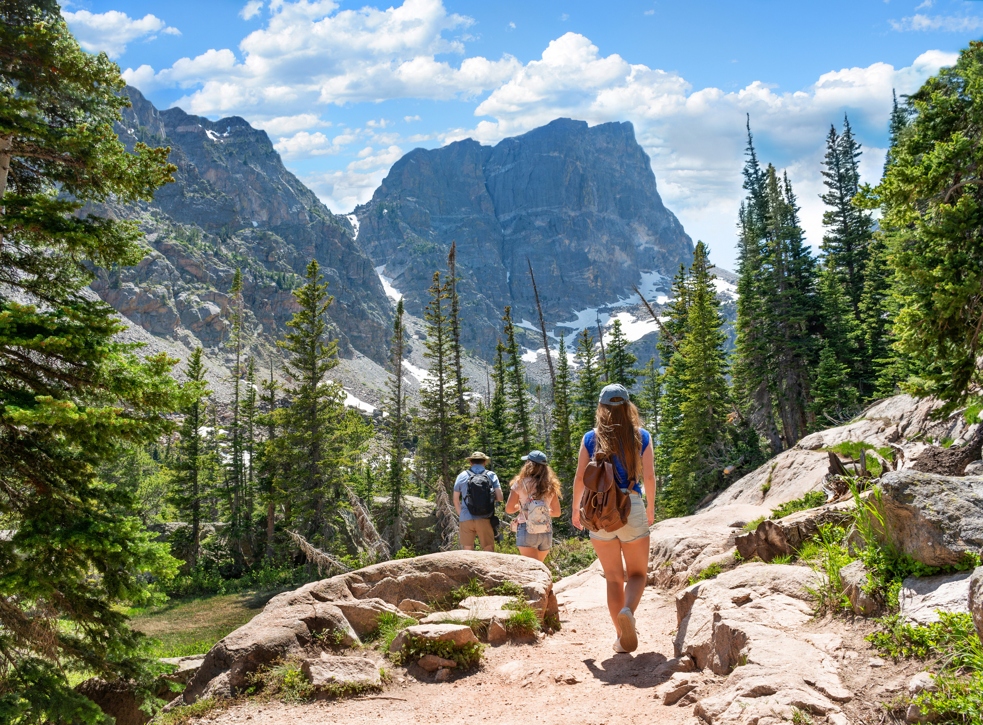 A family hiking in Rocky Mountain National Park.