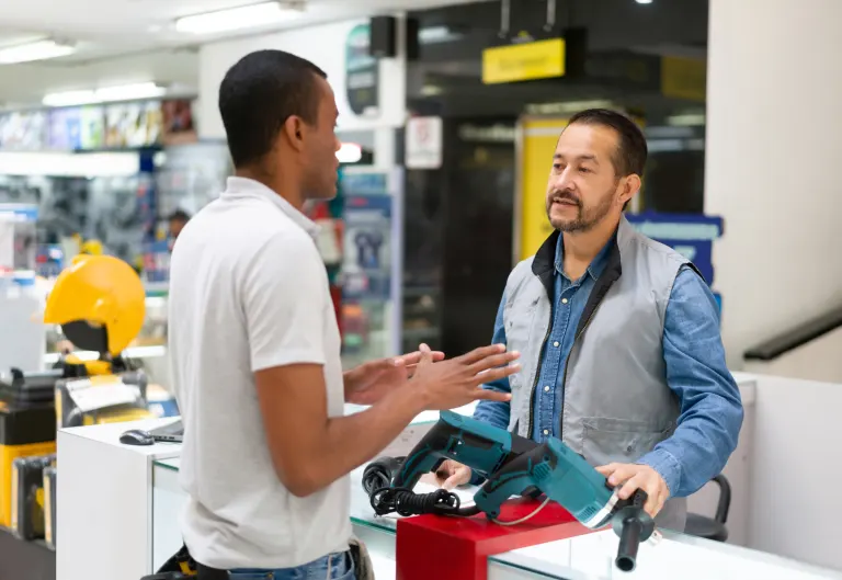 Merchant helping customer