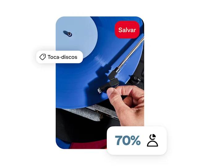Um Pin mostra uma mão posicionando a agulha sobre um disco azul com a palavra "Toca-discos" parcialmente sobreposta e "70%" no canto inferior.