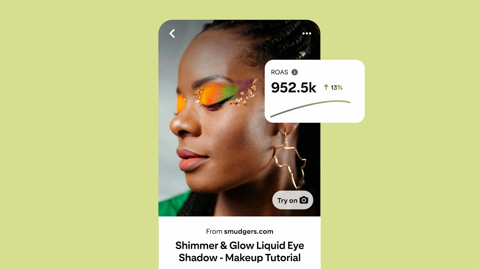 Black woman poses with closed eyes to show her brightly colour orange and green eyeshadow