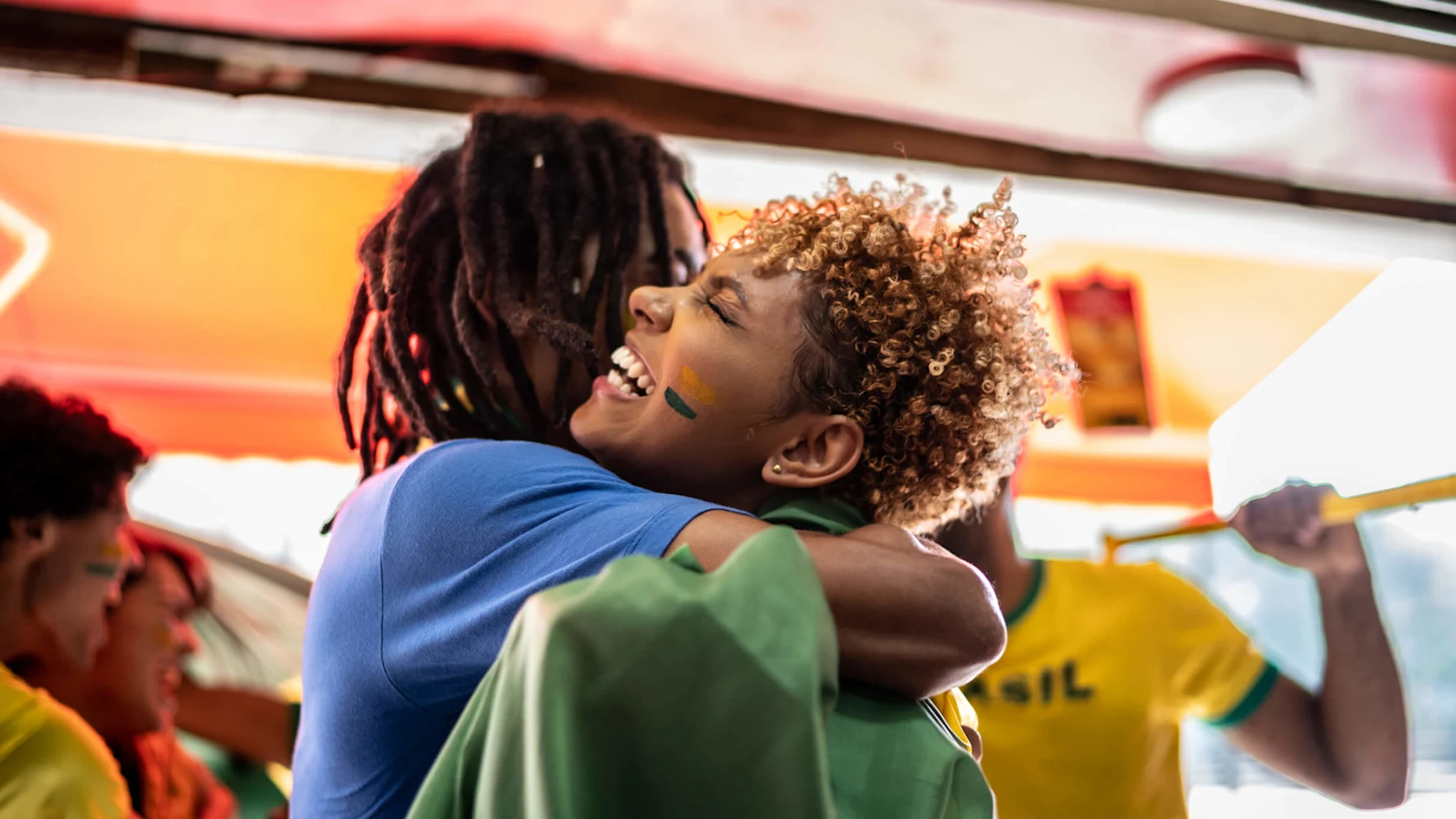A group of football fans celebrate