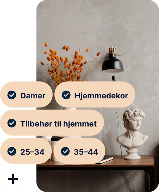 A Pin showing a desk with a vase of orange flowers, a black lamp and a bust of Michelangelo’s David with the search terms Women, Home decor, Home accessories, 25 to 34 and 35 to 44