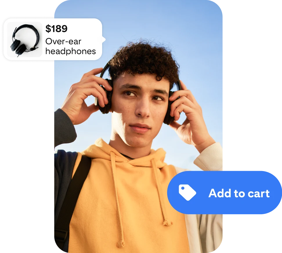 A photo of a young man using headphones, framed on either side by an ad for wireless headphones and an “Add to cart” button