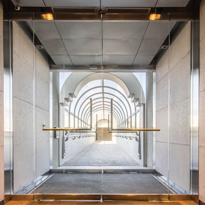 The covered walkway to the parking garage from the Forum building
