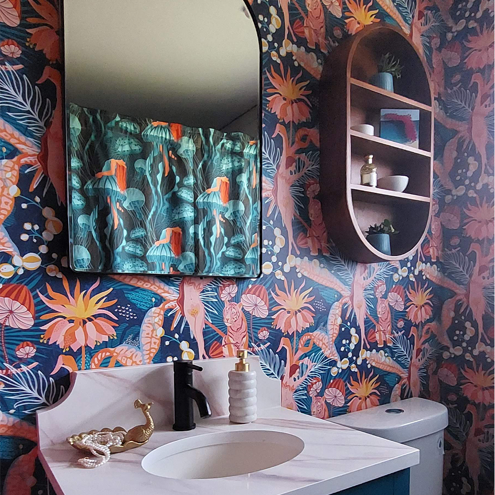 Bathroom with tropical blossom dance wallpaper.
