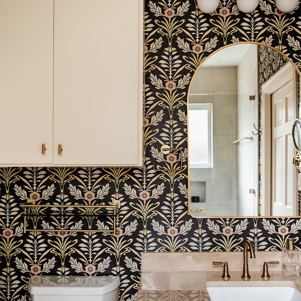 Bathroom with art nouveau floral wallpaper.