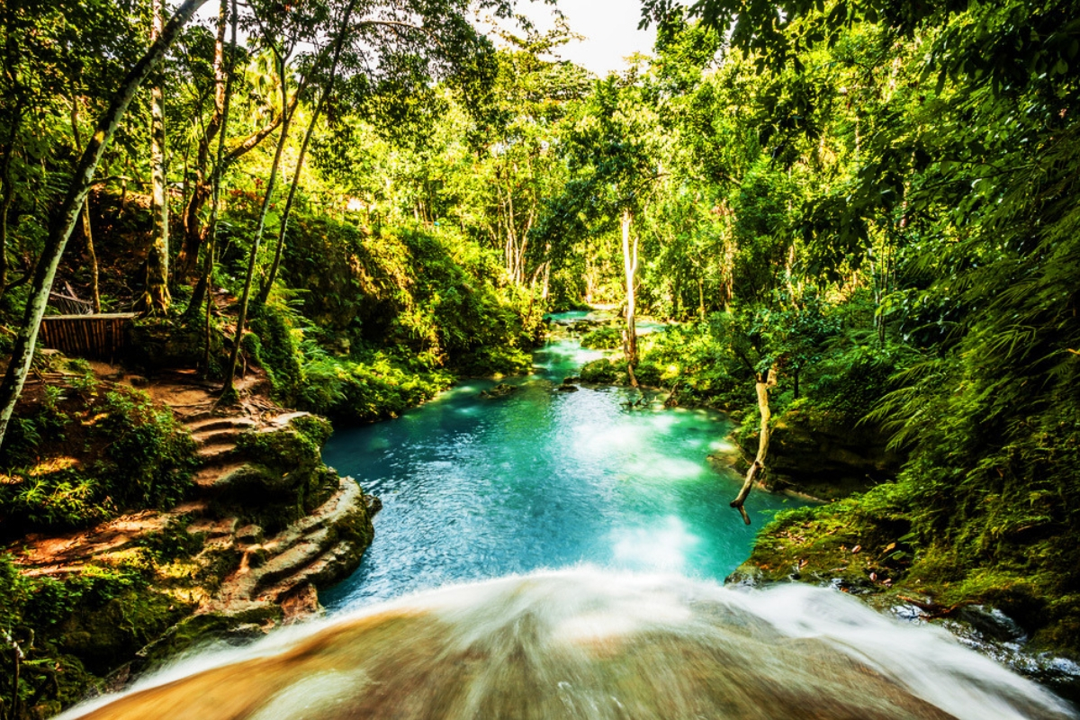 Tranquil pool and waterfall at Blue Hole
