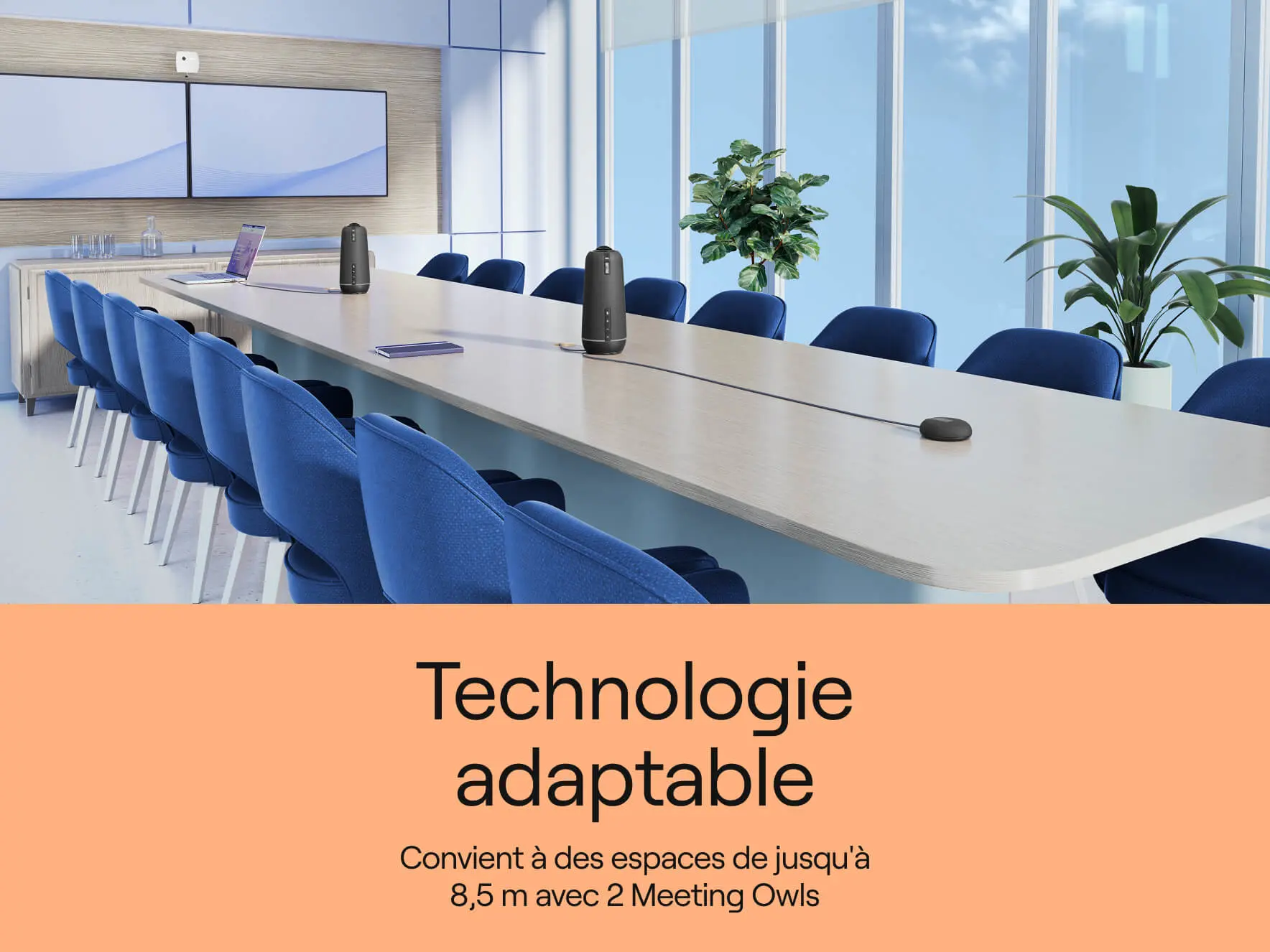 Modern conference room with two Meeting Owls to expand coverage up to 28 feet for hybrid meetings