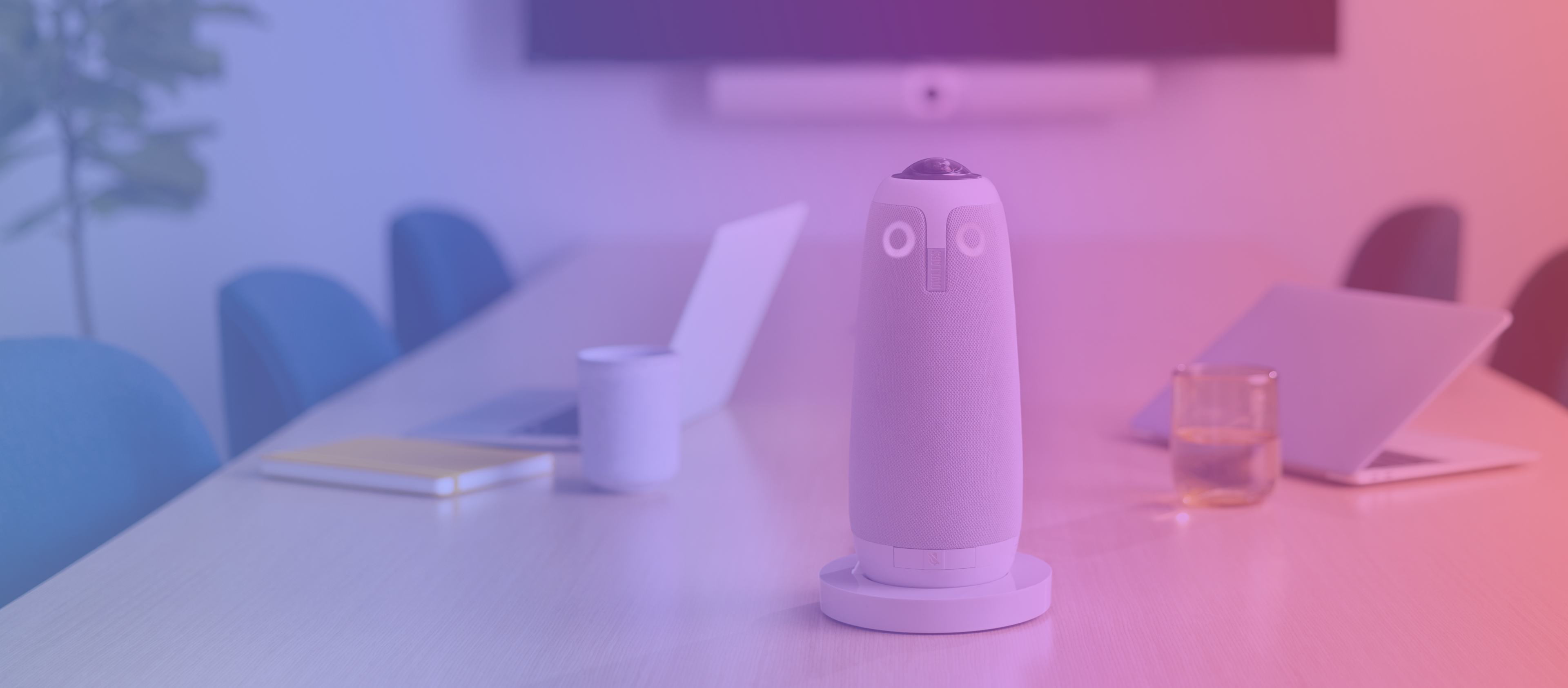 Meeting Owl 3 on stand in a conference room setting