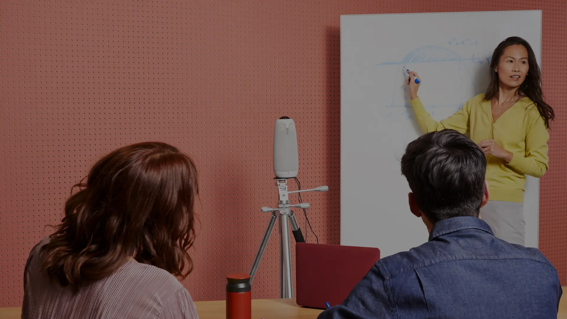 Owl Labs technology being utilized in an education setting, classroom by teacher or professor