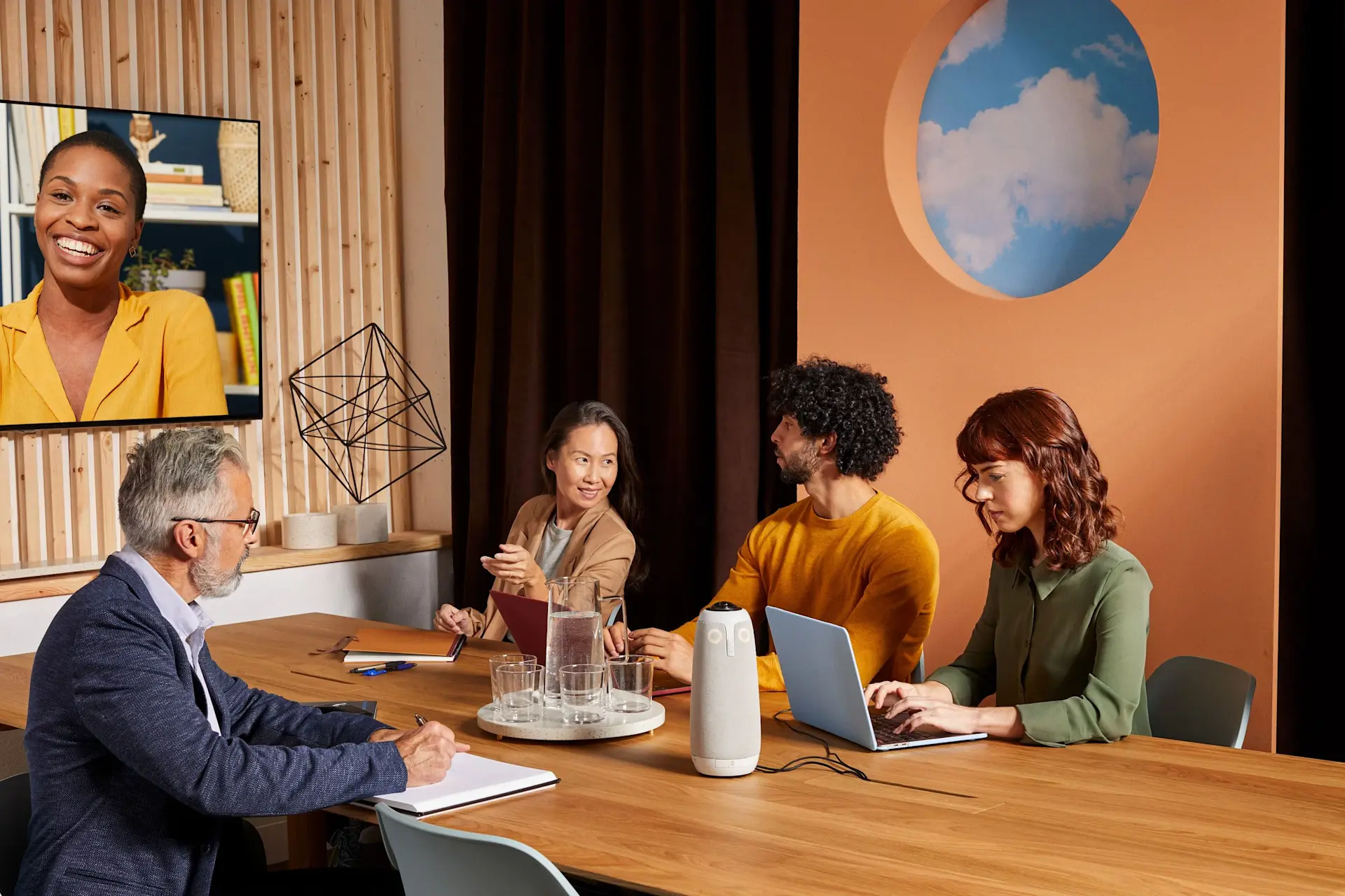 University of Minnesota Featured Image - Owl Labs - Professionals connecting in a hybrid workspace