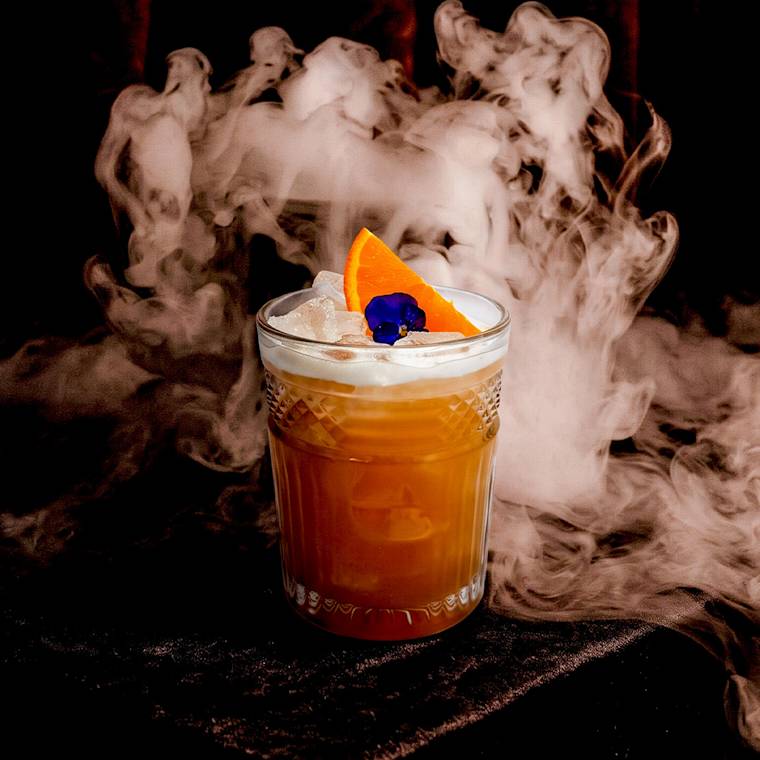 The Scarlett Spell cocktail, with Altos Tequila, Mezcal, Hibiscus syrup, orange juice and citrus. The Scarlett Spell cocktail, with Altos Tequila, Mezcal, Hibiscus syrup, orange juice and citrus.