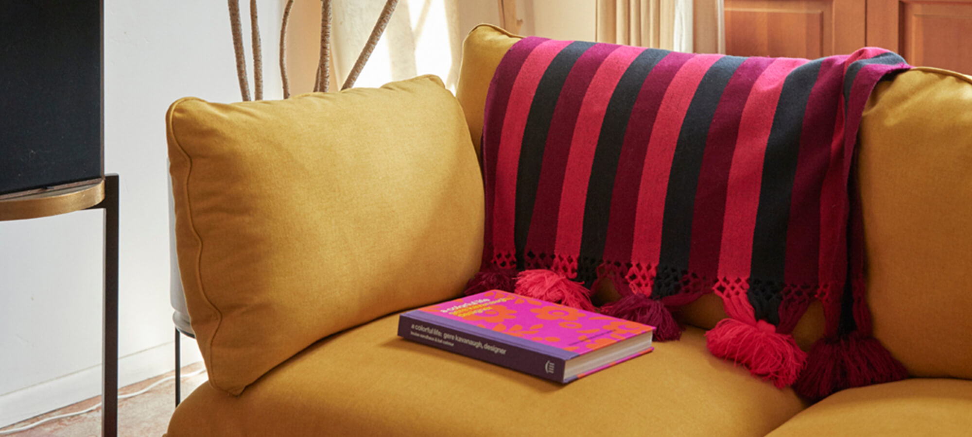 Book on the Floyd Sofa in Saffron.