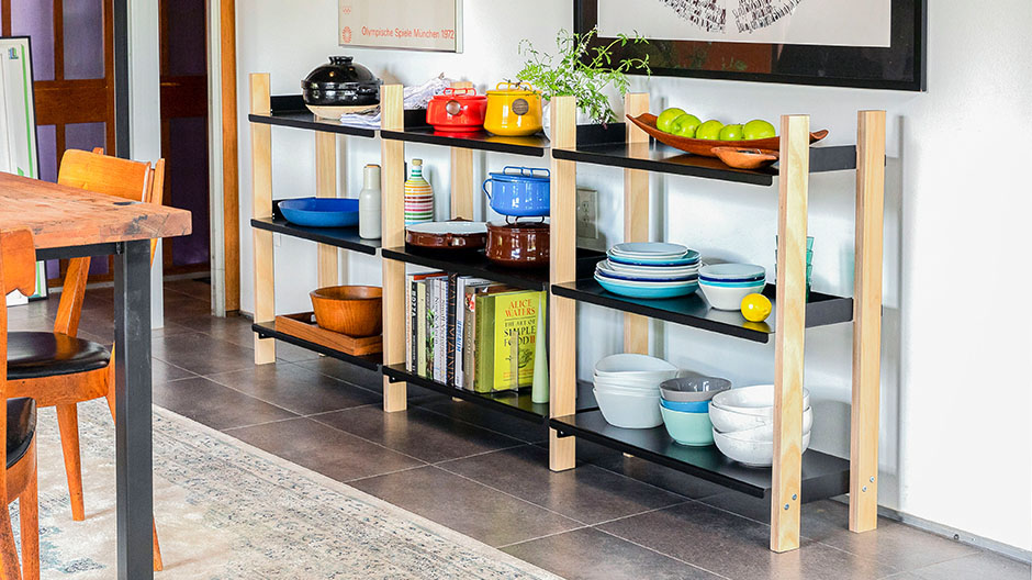 Shelving unit against wall in dining room